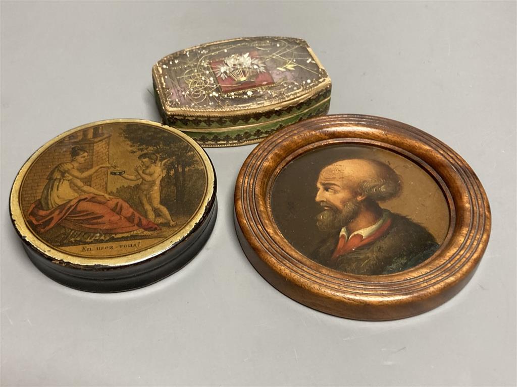 An Austrian papier mache portrait of a gentleman, in turned frame, early 19th century, a similar box of a classical scene and a seed pe